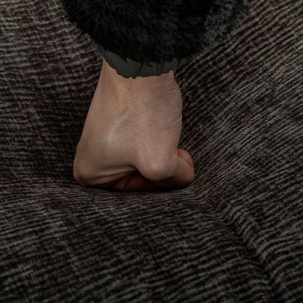 Close-up of dark gray sofa upholstery fabric texture