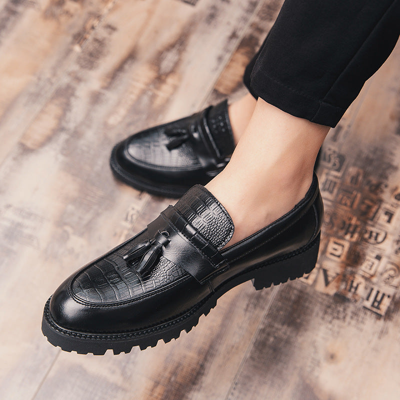 Men's leather loafers with tassel detail, black with patterned side strap