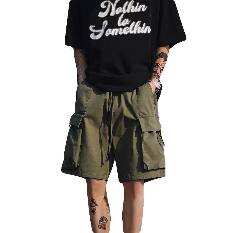 Olive cargo capri pants with large flap pockets and drawstring waist