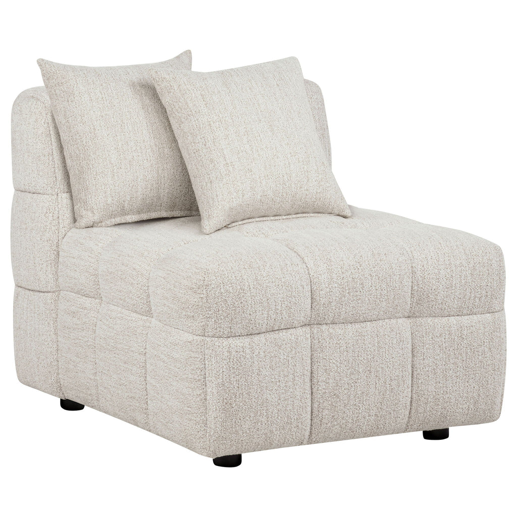 Light beige lounge chaise with two large seat cushions and three back pillows