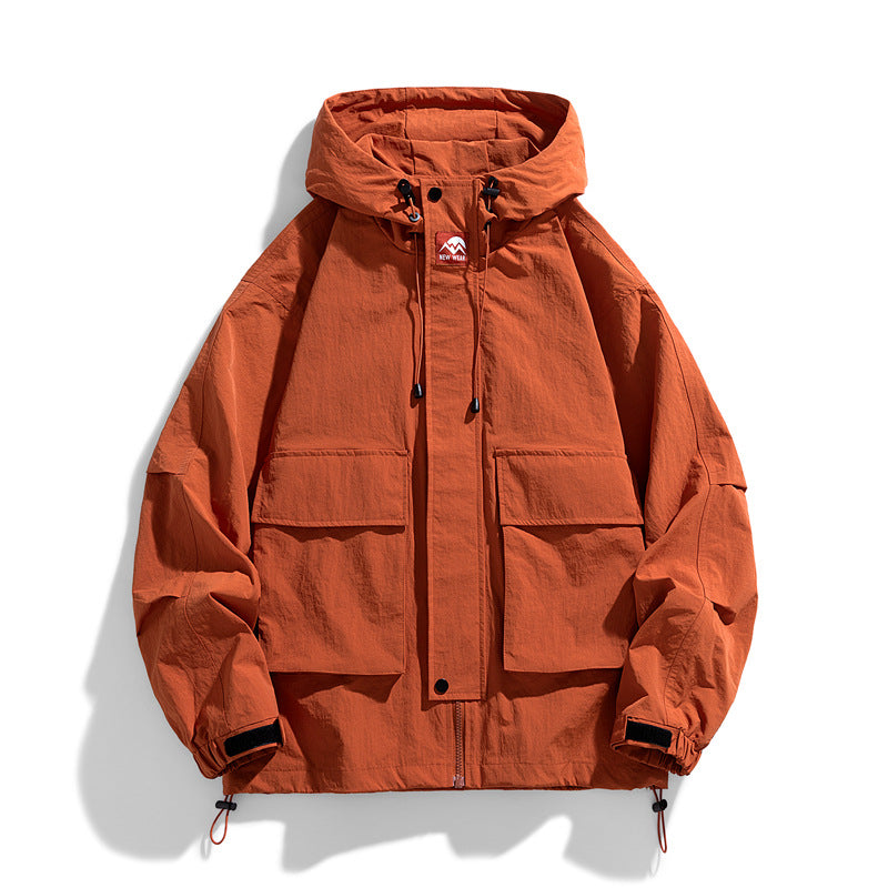 Orange hooded zip-up work jacket with chest pockets and adjustable drawstring hood
