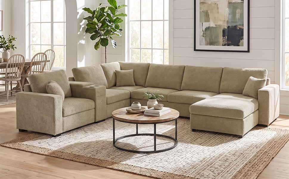 Beige modular sectional sofa with chaise and rounded corner armrest cushions