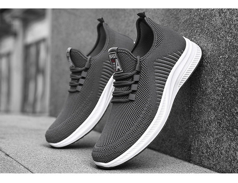Gray mesh knit sneakers with lace-up and white rubber sole