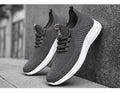 Gray mesh knit sneakers with lace-up and white rubber sole