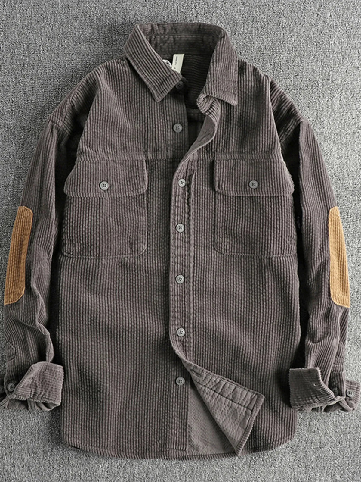 Plus-size corduroy button-up shirt in dark gray with two chest pockets and tan contrast sleeve panels