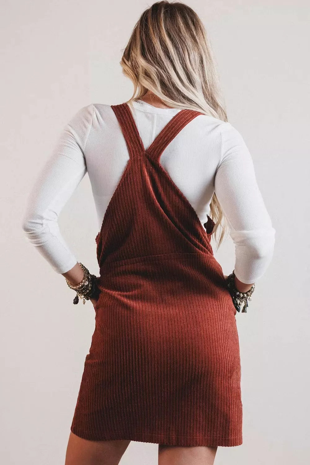 Burgundy ribbed corduroy zip-up sleeveless pocket sheath dress, back view