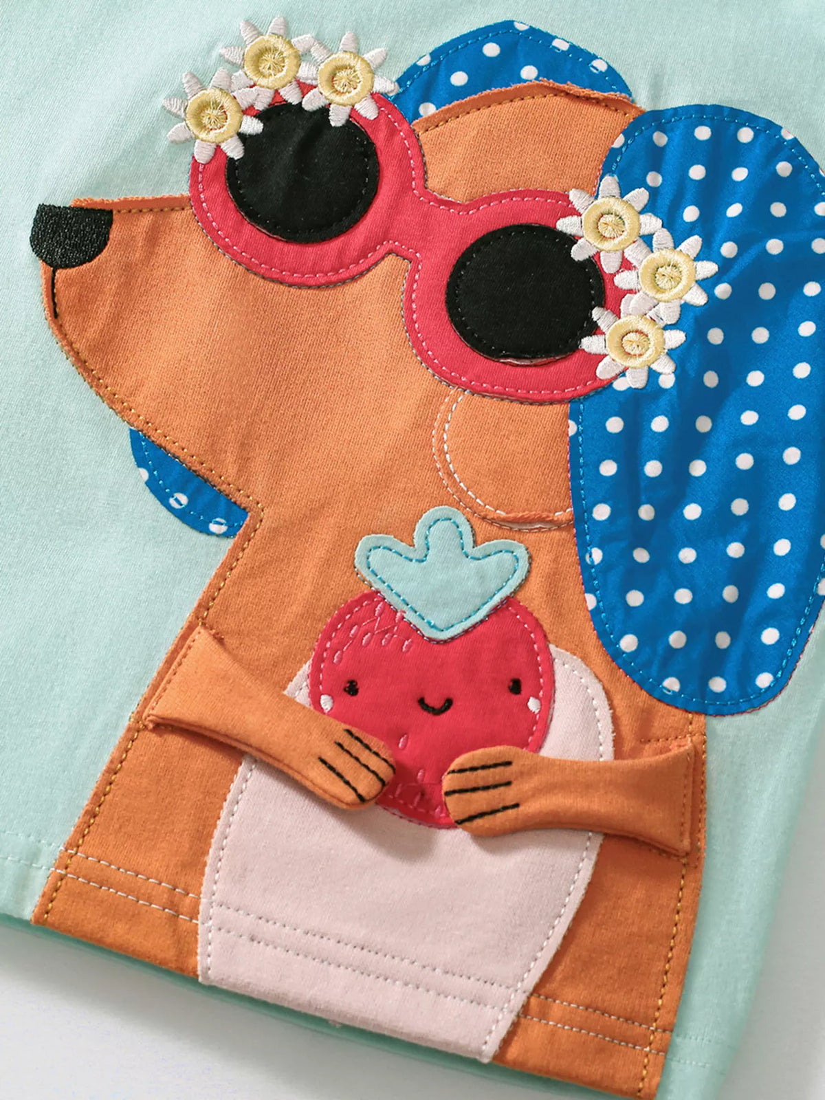 Children's animal tee with dog applique, flower sunglasses, and blue polka dot ears