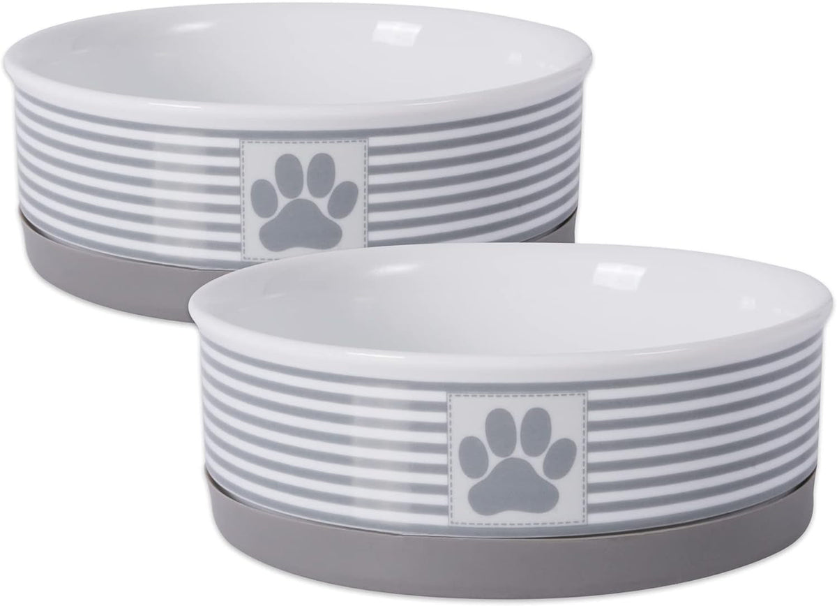 Two gray and white striped ceramic pet bowls with paw-print badges and removable bases