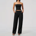 Black strapless yoga set with cropped bandeau top and high-waisted wide-leg pants