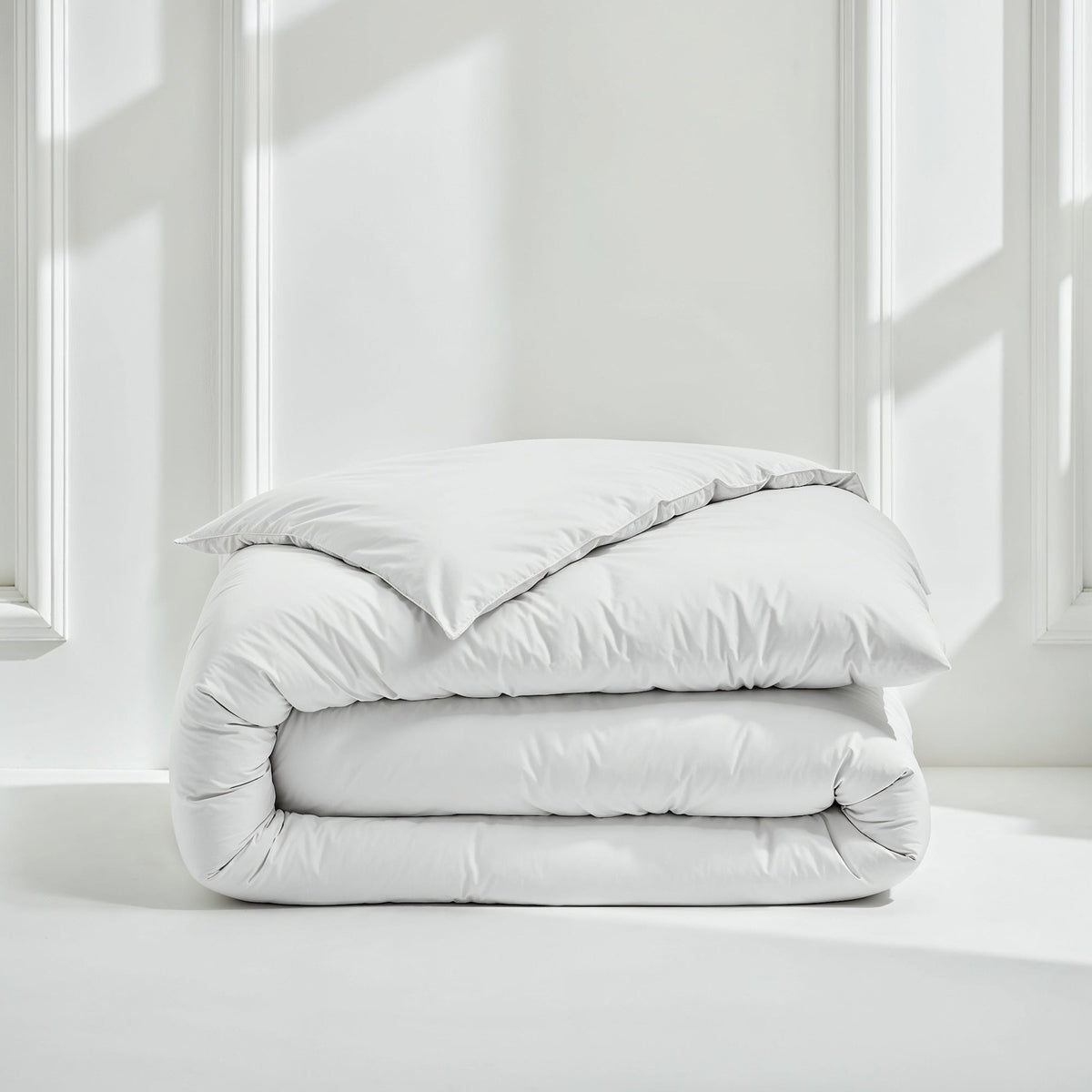 White sateen bedding bundle: folded duvet and pillow shams