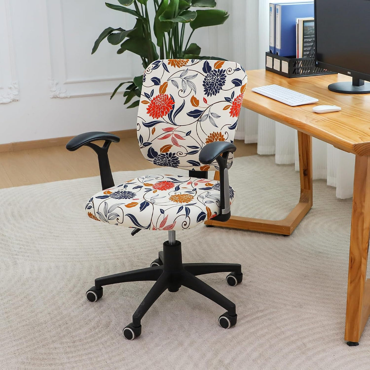 Stretch office chair cover in white with floral pattern covering seat and backrest
