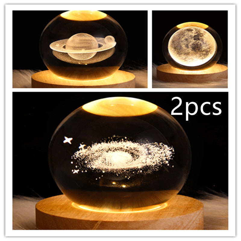 LED galaxy crystal ball lamp with floating planet and star-dust glow; wooden base