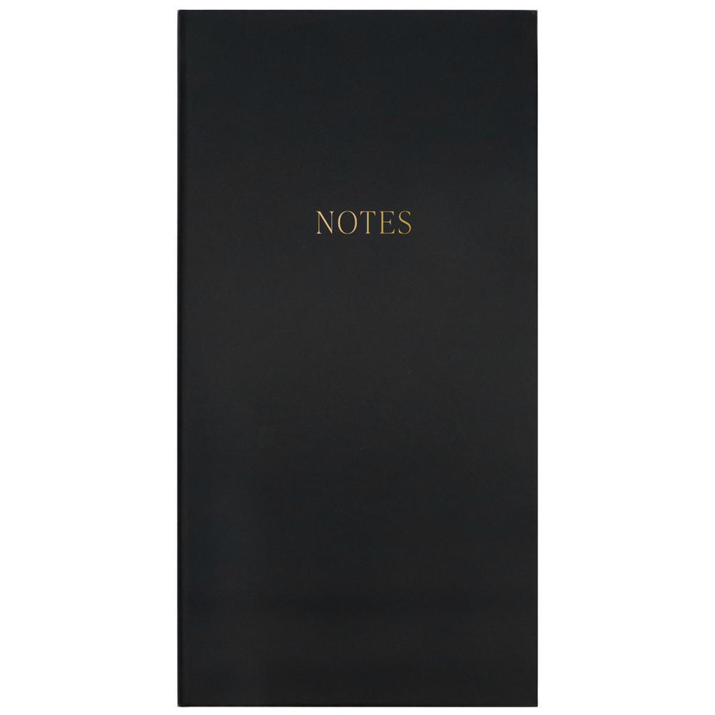 Matte black notes booklet with centered gold “NOTES” text on the cover.