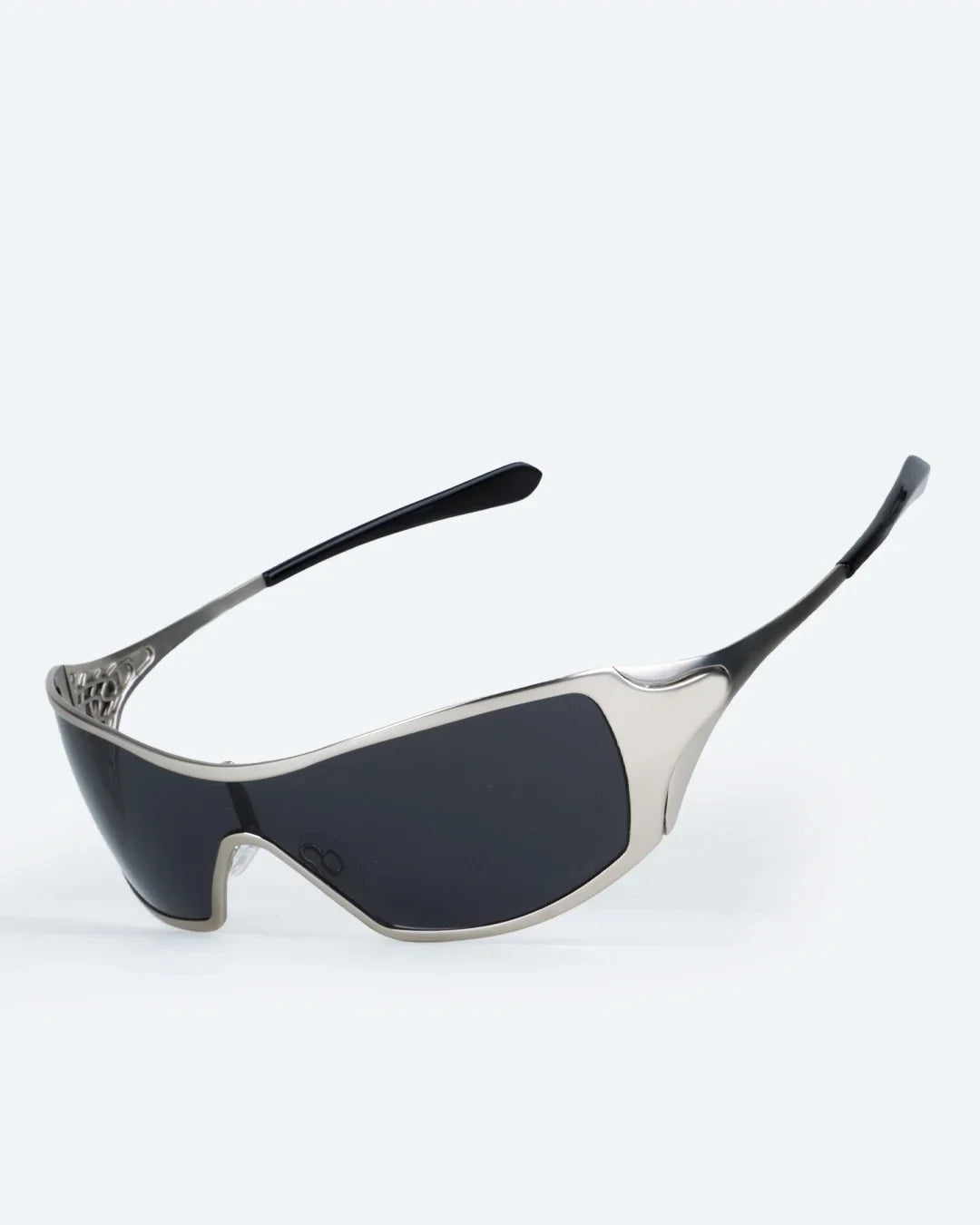 Polarized sunglasses with dark lenses and silver-gray frame, angled side view