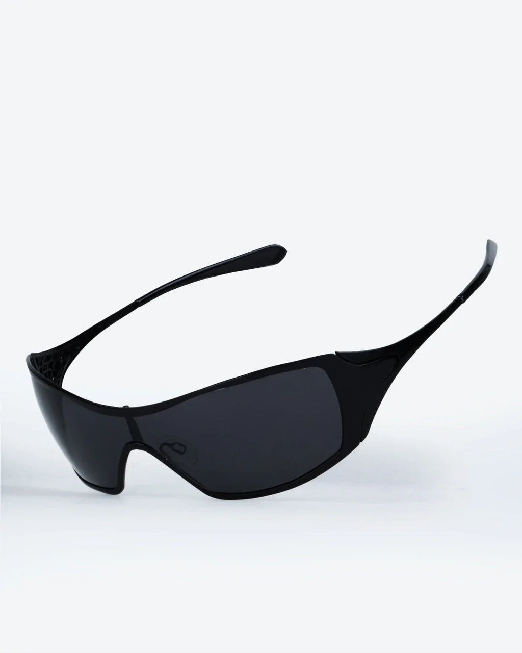 Polarized sunglasses in profile, dark lenses and black wraparound frame