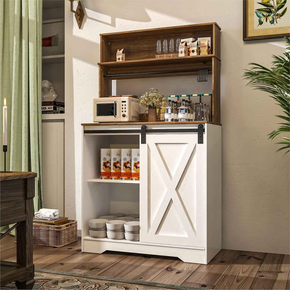 White coffee bar cabinet with interior shelves for mugs, bottles, and cabinet storage bins