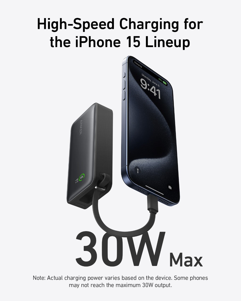 Black power bank with built-in USB-C cable connected to a phone, showing 30W max
