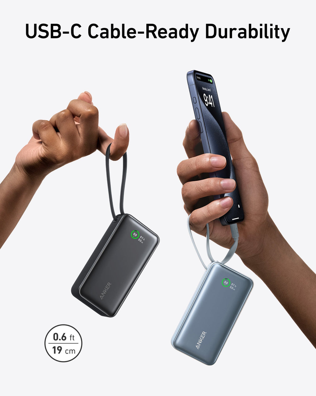 Portable power bank with built-in USB-C cable, dark gray/black, compact design