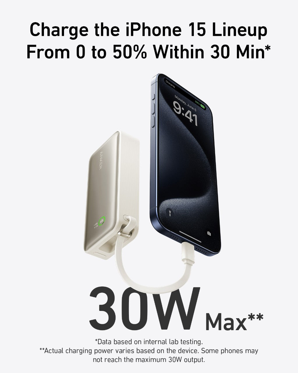 Shell white power bank with built-in USB-C cable charging a phone, showing 30W max