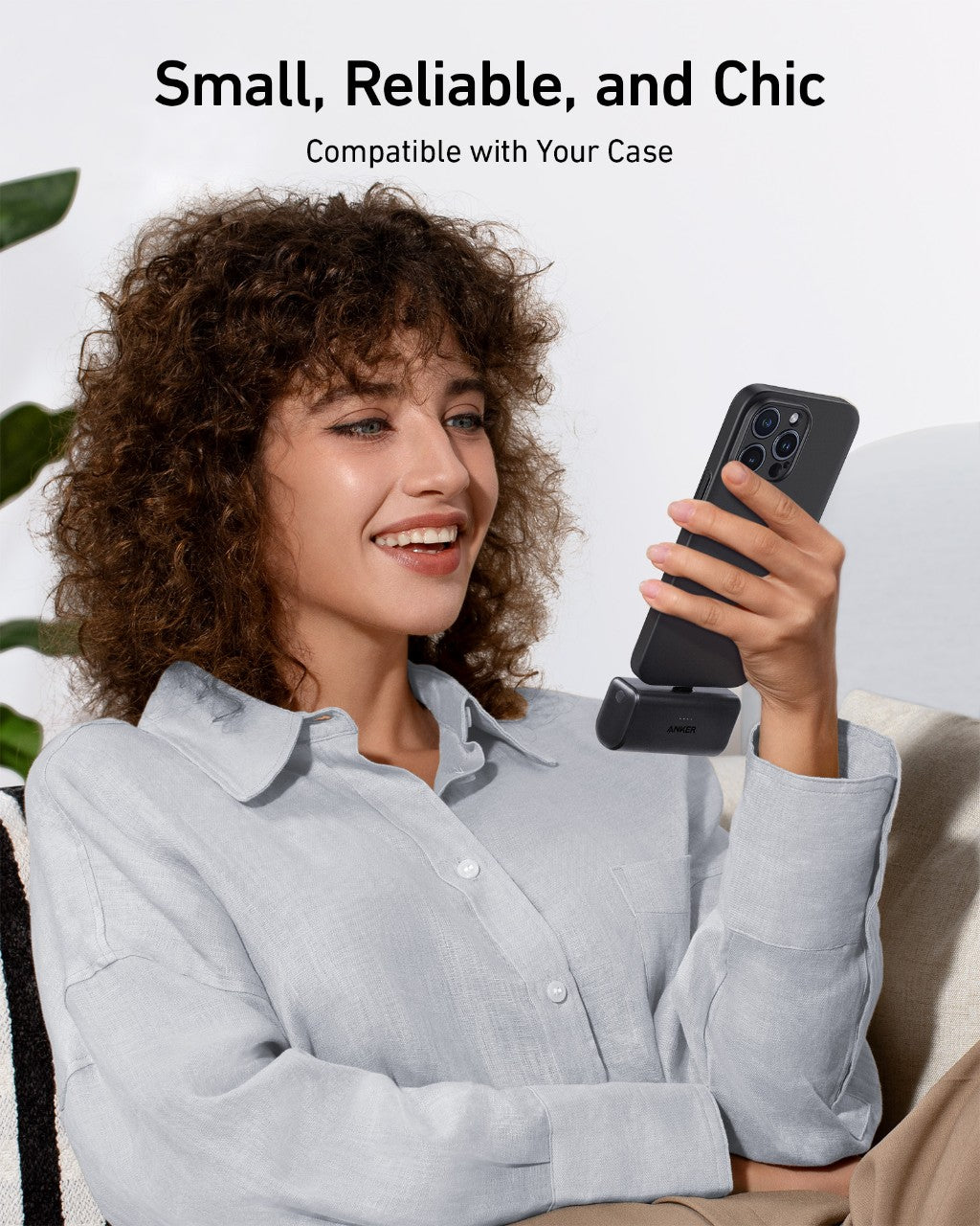 Black Anker Nano power bank with built-in USB-C connector, compact rectangular charging device.