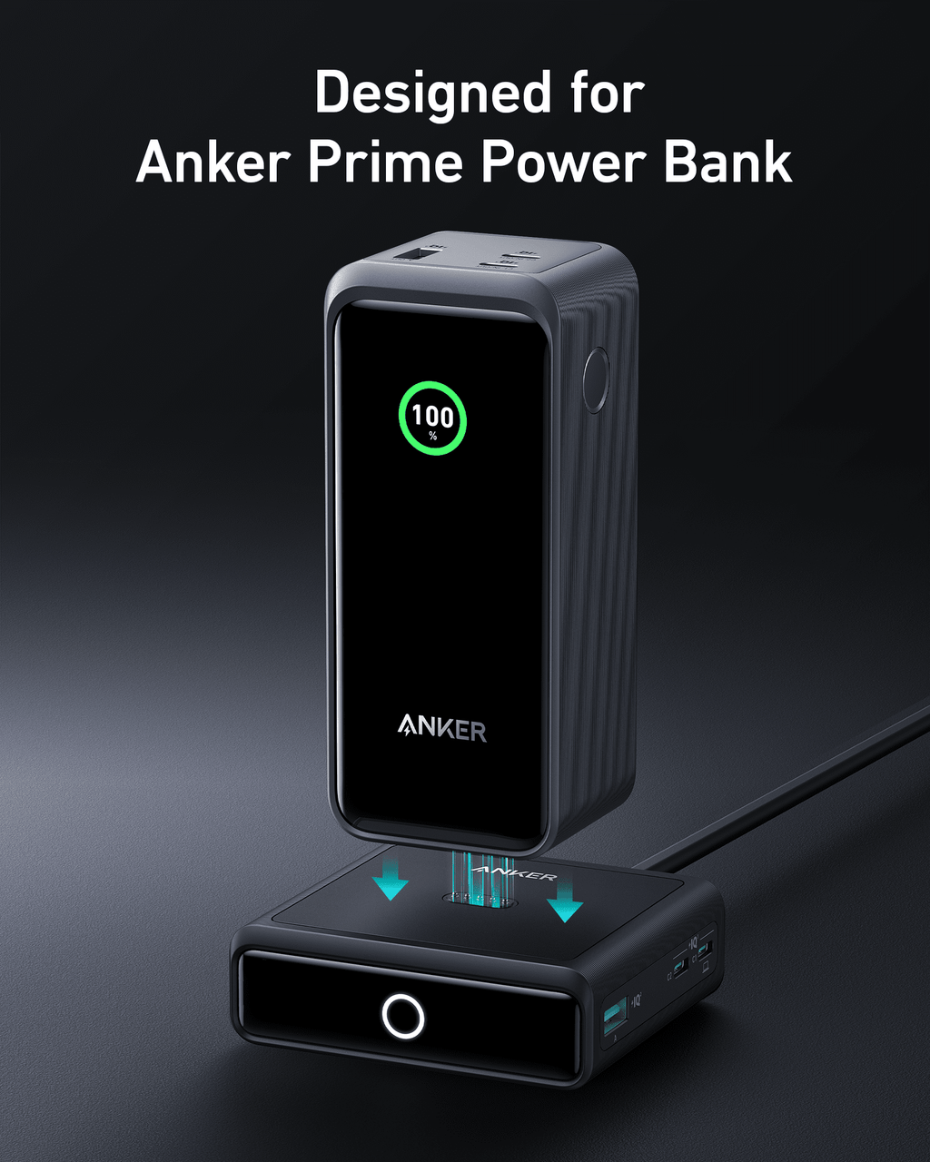 Anker 100W charging base holding a power bank vertically with USB-C ports