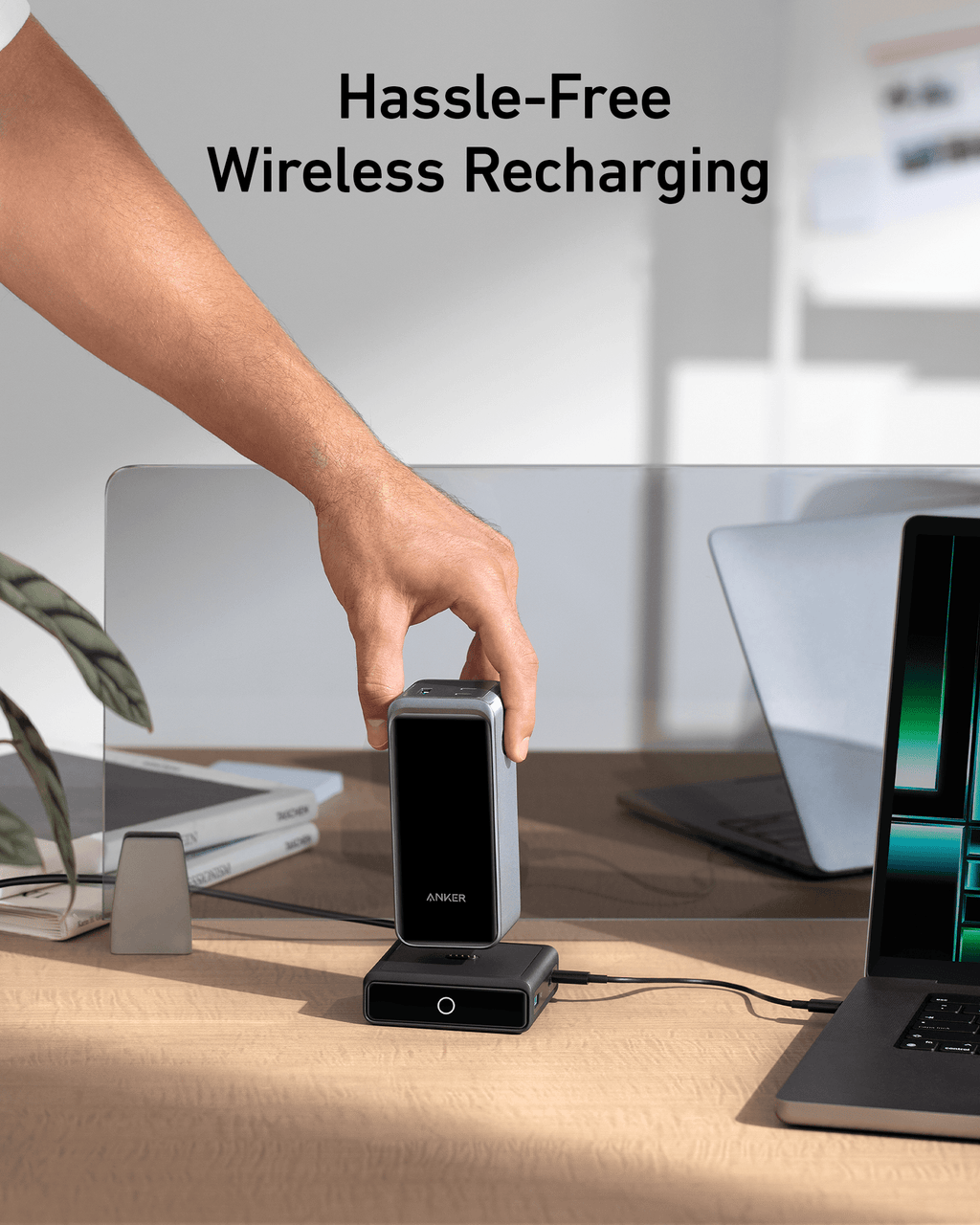Anker 100W charging base with docked power bank and exposed side ports