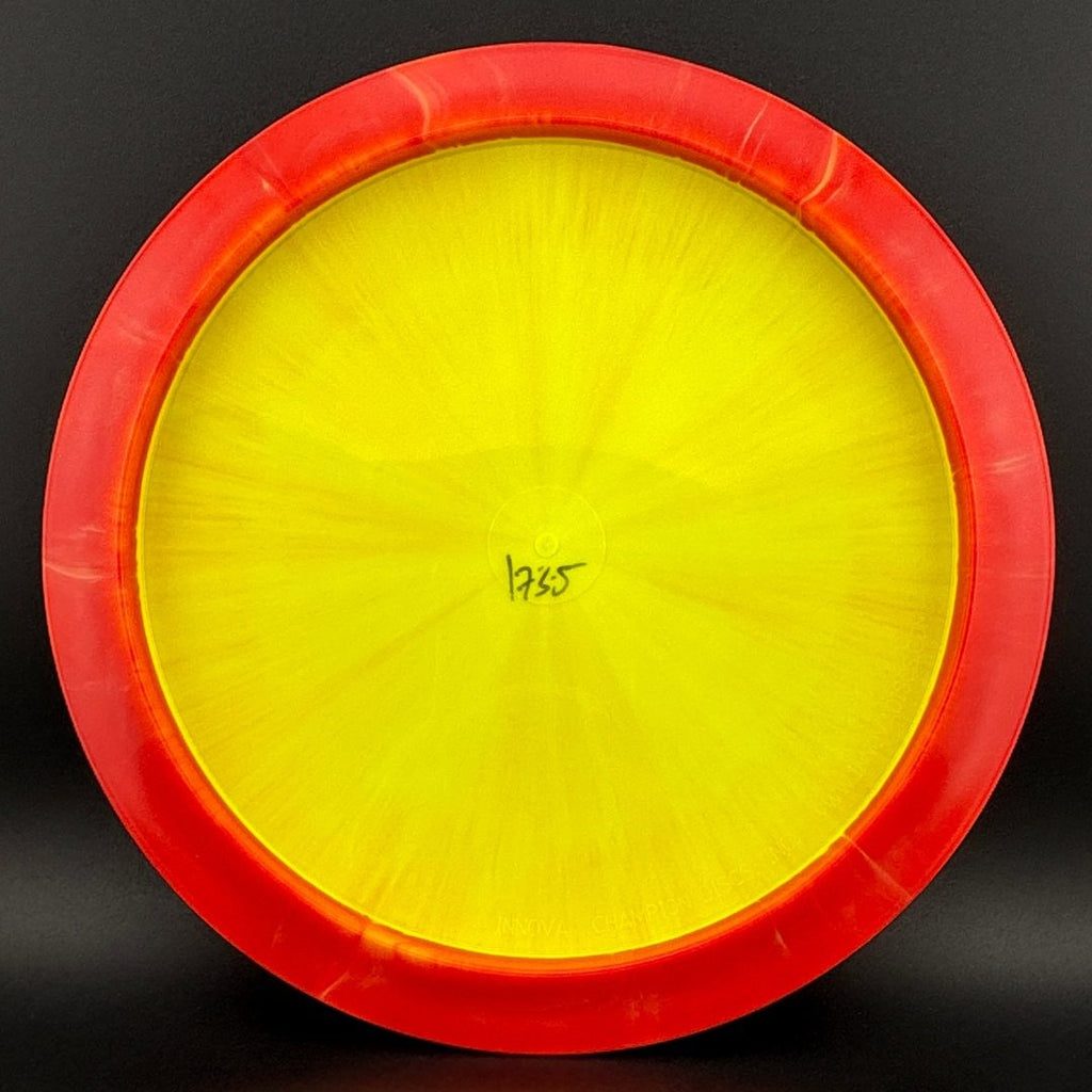 Disc golf driver underside with yellow interior and red rim