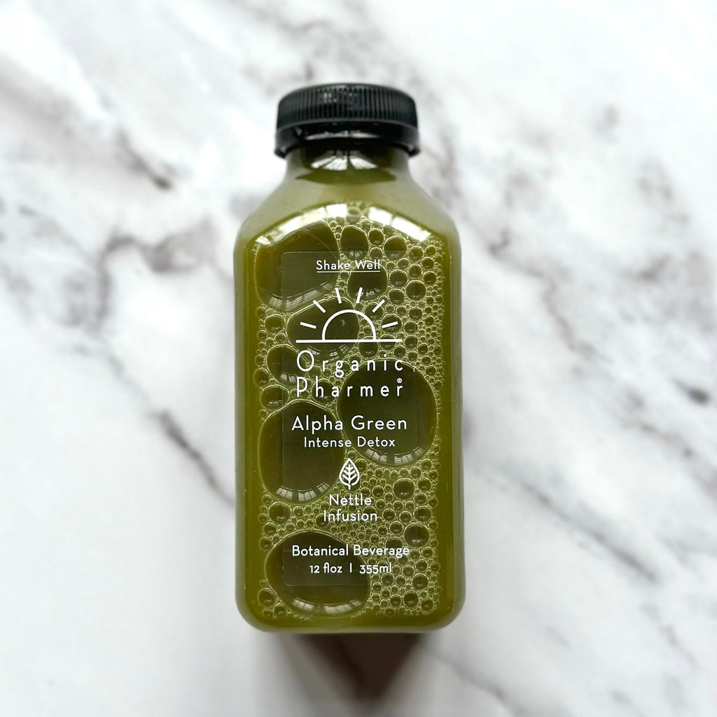 Organic green juice bottle with black cap, 'Intense Detox' and 'Nettle Infusion' 