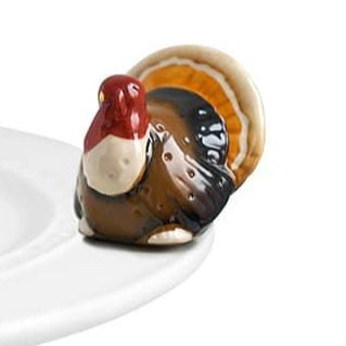 Mini ceramic turkey serving topper, brown body with red head and white beak