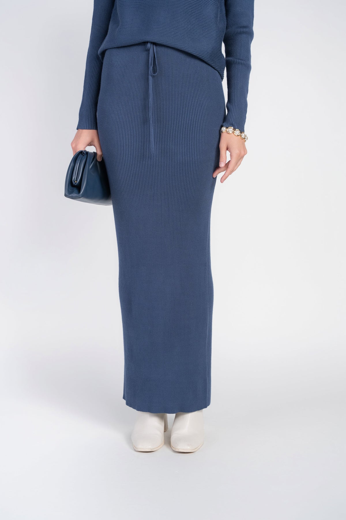 Rib knit sweater skirt with drawstring waist, long blue pencil silhouette