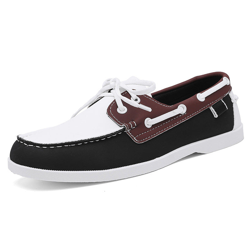Men's two-tone loafer shoes with white toe, black upper, brown trim, white laces