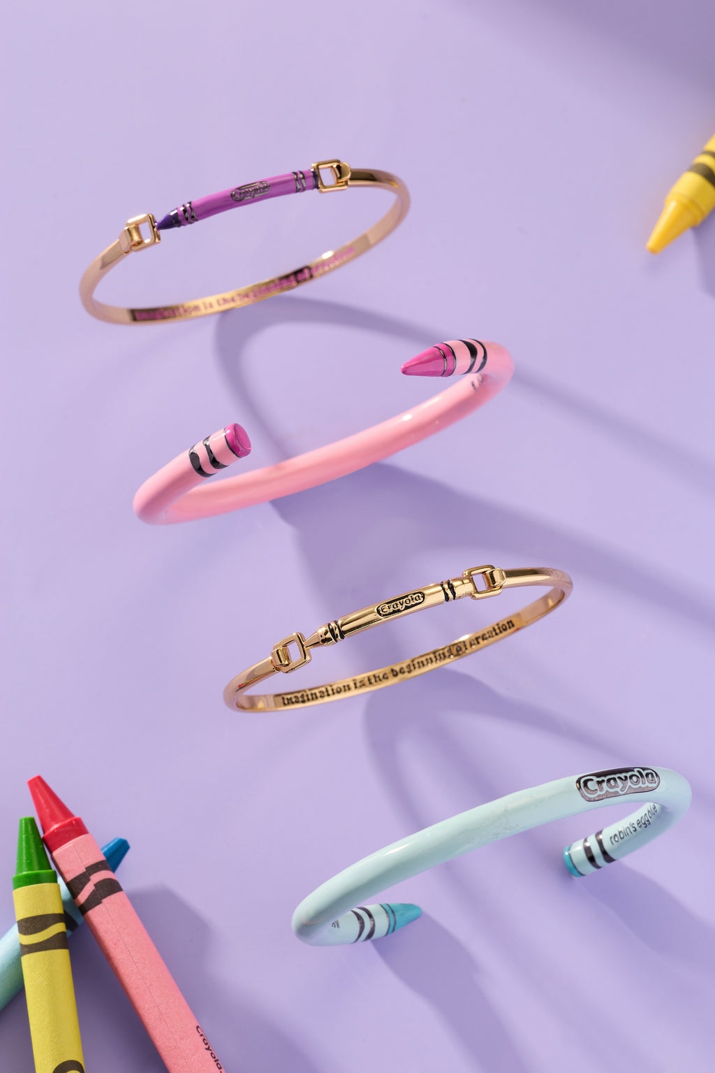 Crayon cuff bracelet with gold clasp and pink striped crayon-style accents