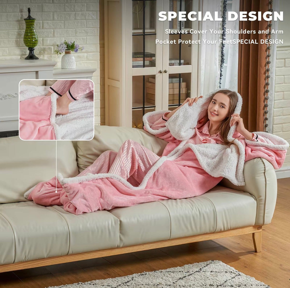 Pink hooded heated blanket with sherpa lining and controller, lounging on sofa