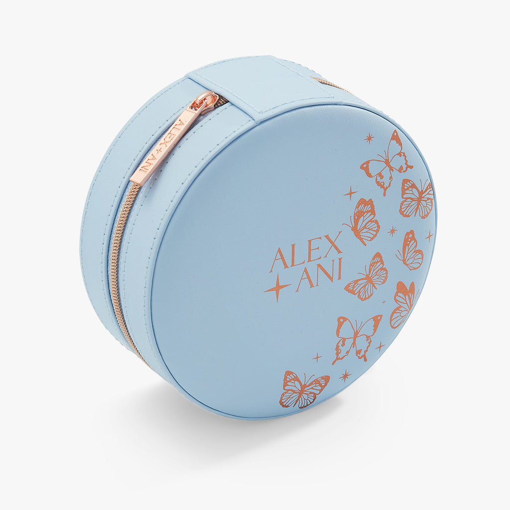 Light blue round jewelry case with orange butterfly print and zipper detail