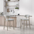 ACTU bar stools set of 2 with light wood frames and cream upholstered seats