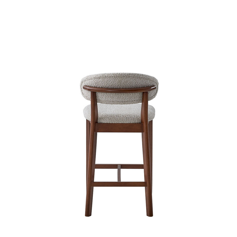 Upholstered bar stool with light gray boucle seat, rounded back, dark wood frame