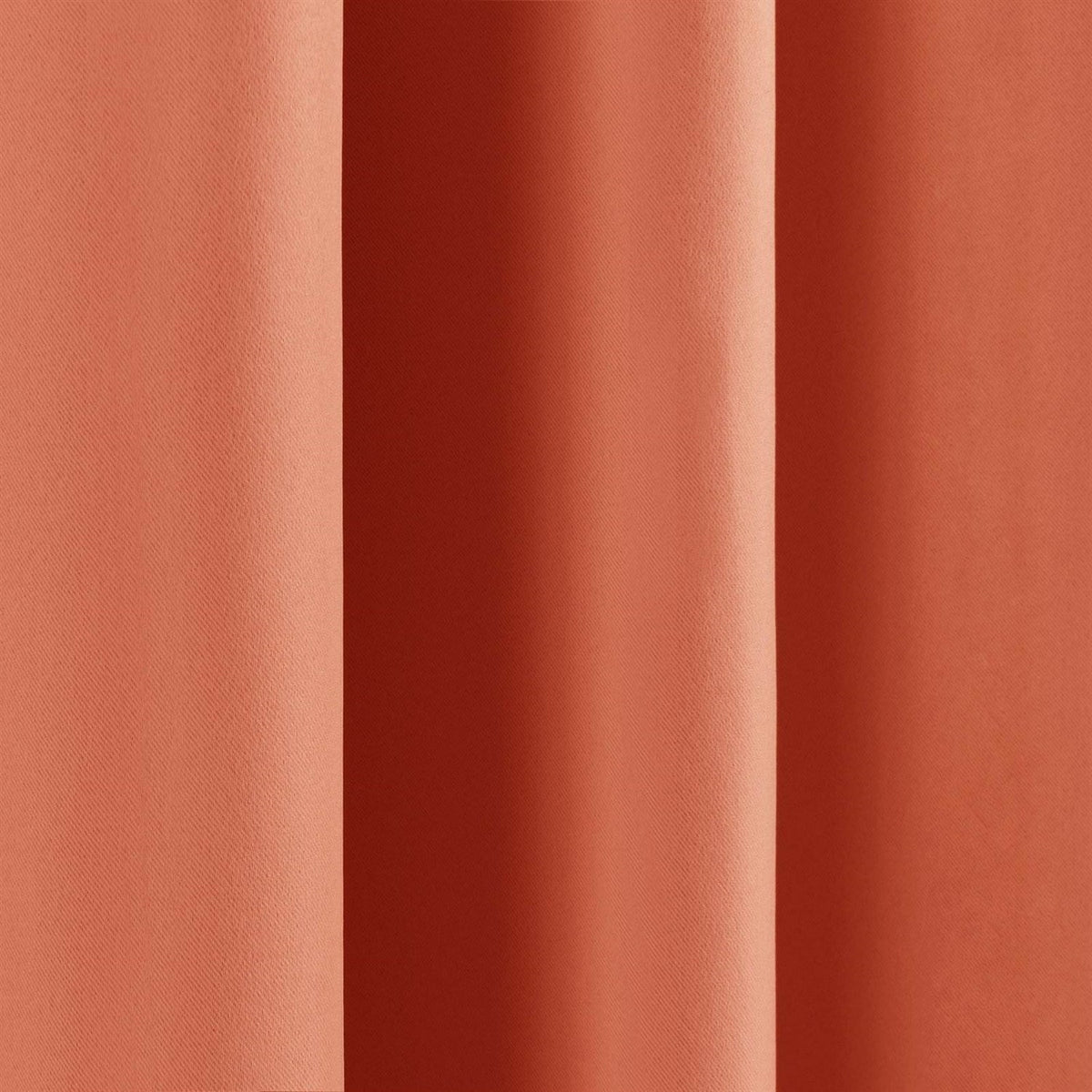 Apricot thermal blackout curtain fabric close-up with smooth woven texture