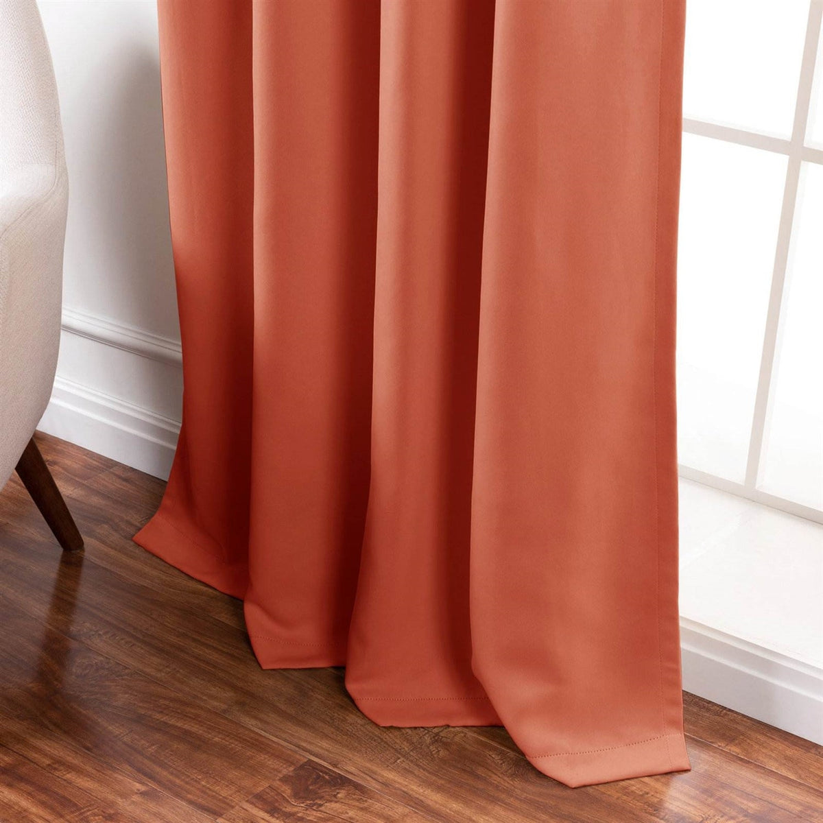 Apricot thermal blackout curtain panels with long floor-length drape and pleats