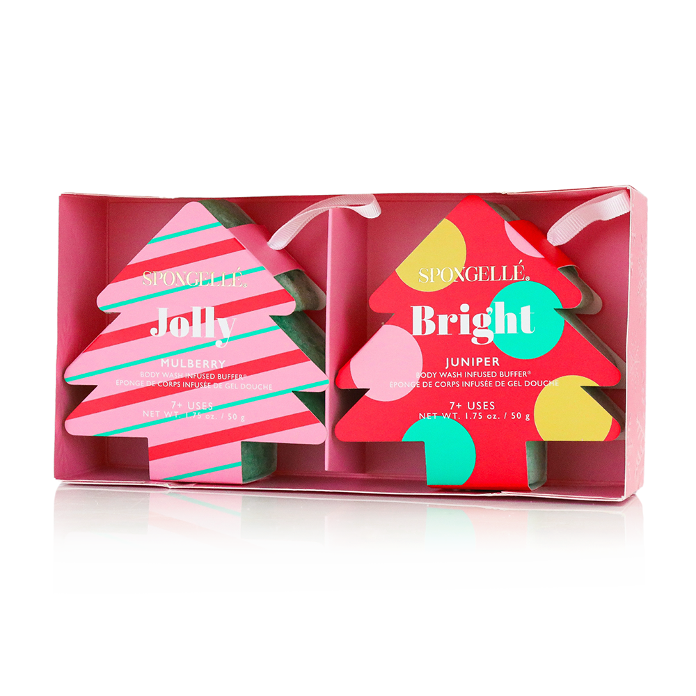 Gift box open with two tree-shaped body wash sponges labeled Jolly and Bright