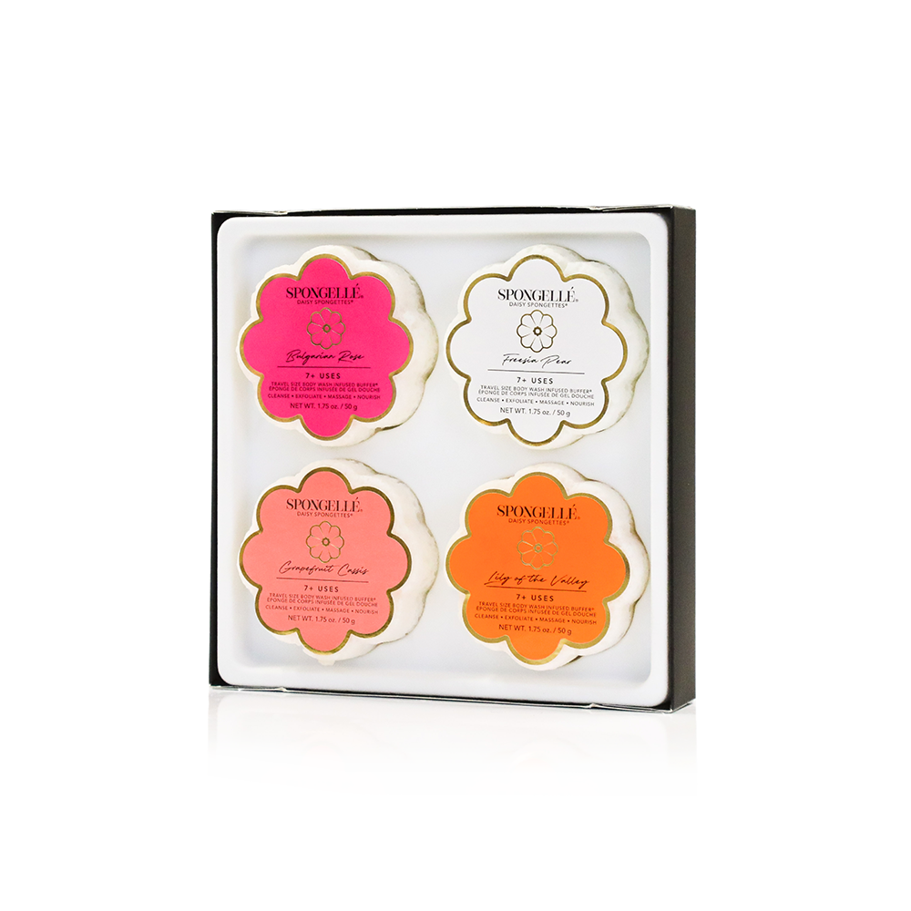 Four flower-shaped sponge buffers in gift box: pink, white, coral, orange