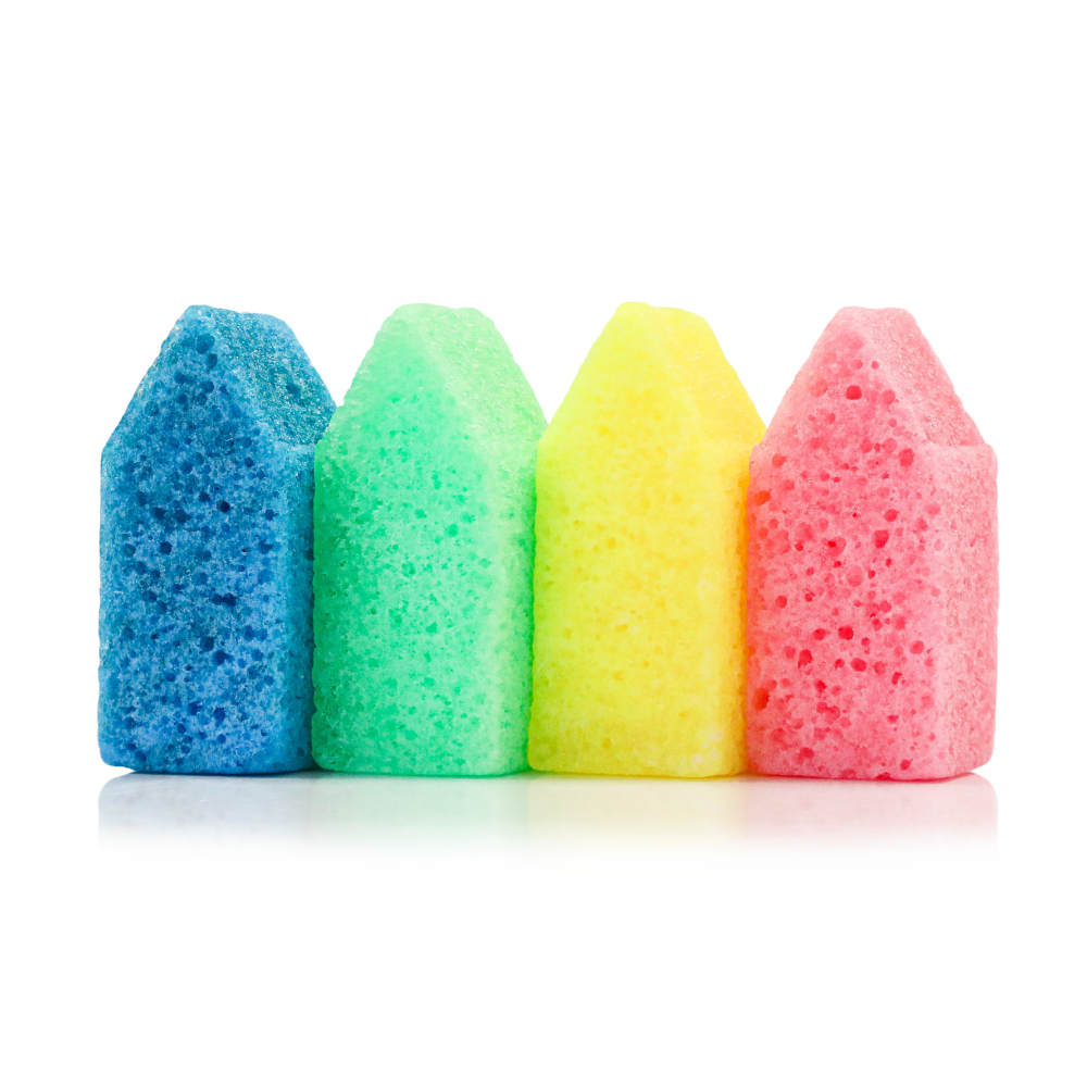 Four body wash sponge wedges in blue, green, yellow, and pink