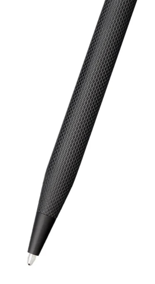 Black PVD ballpoint pen close-up of textured barrel and pointed tip