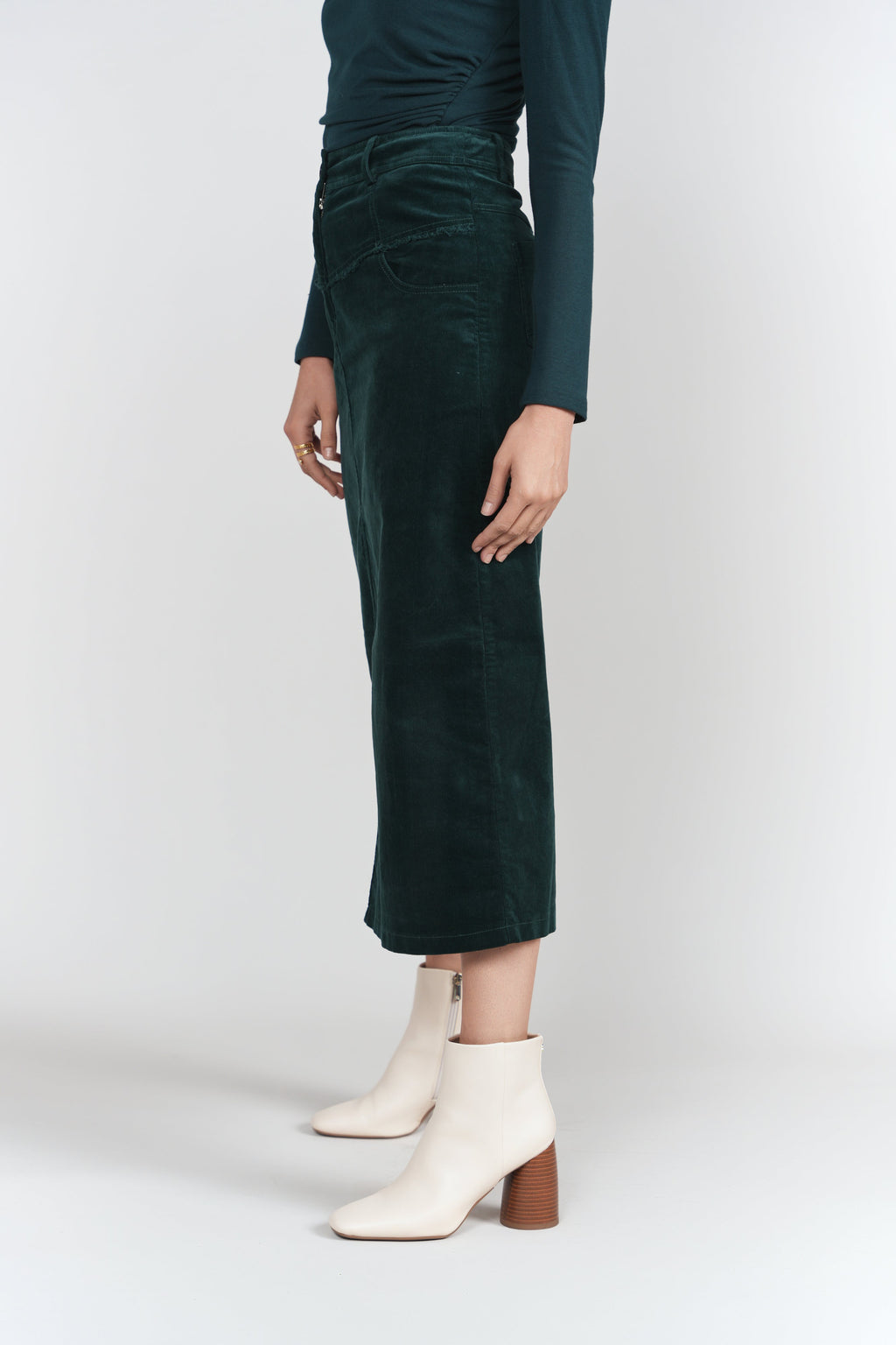 Emerald corduroy midi skirt, fitted waist and straight hem