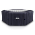 Navy octagonal inflatable hot tub with Wave logo and side control knobs