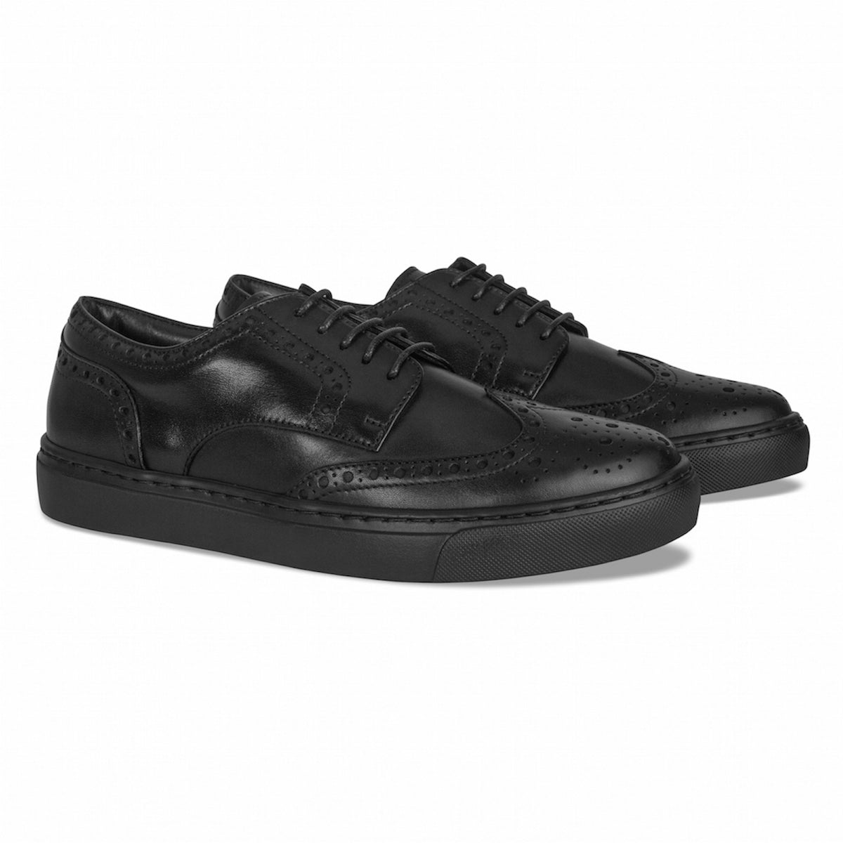 Black leather lace-up oxford sneakers with side brogue pattern and cushioned sole