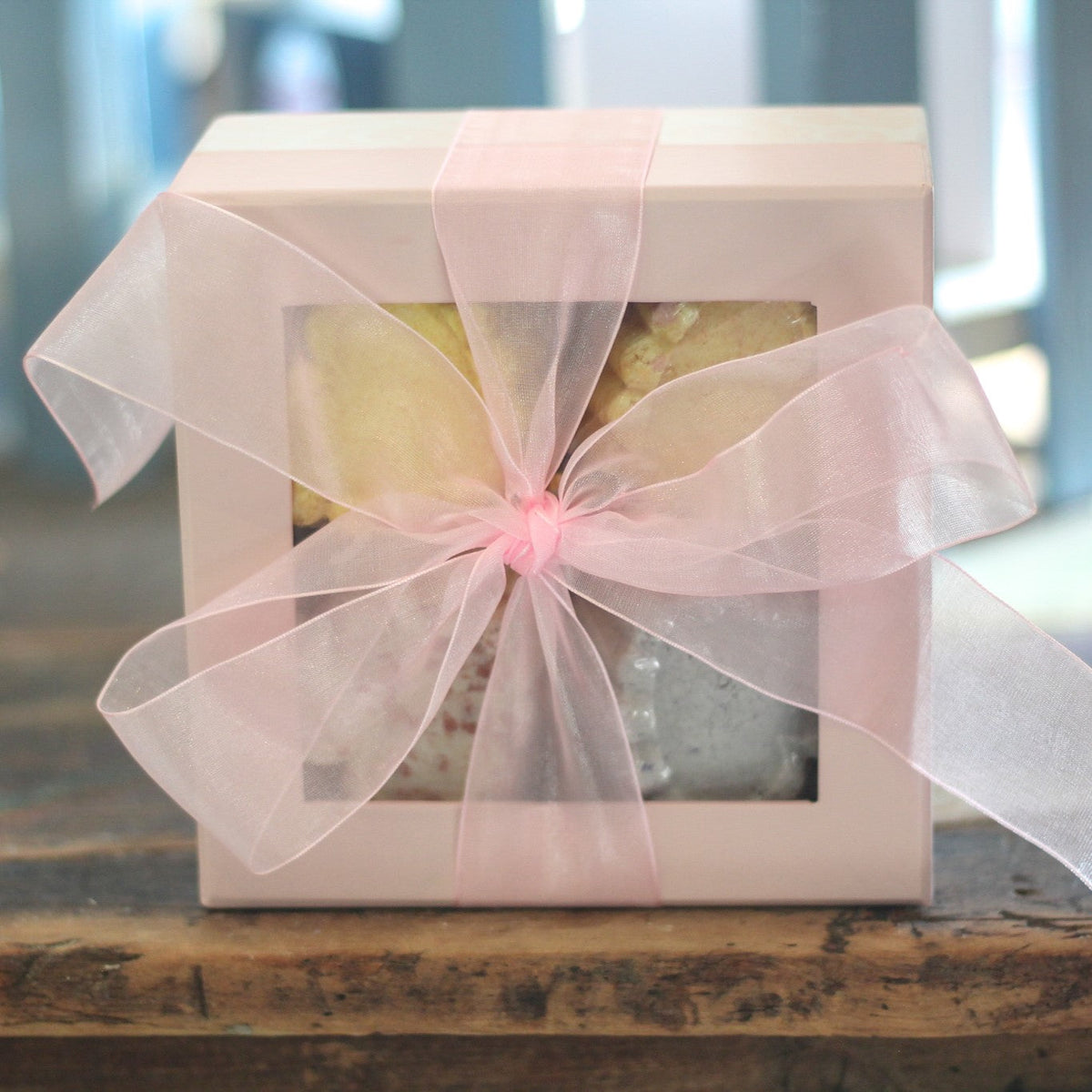 Bubble bomb gift box with pale pink ribbon and sheer bow