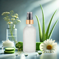 Serene gel cleanser bottle with silver pump, frosted white container