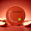 Round tummydrops dietary supplement tin lid with 18 lozenges and ginger-apple flavor
