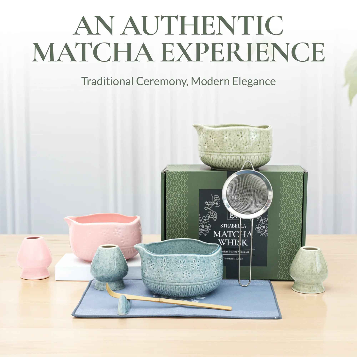 Matcha whisk set with speckled ceramic chawan bowl, bamboo whisk, and metal strainer