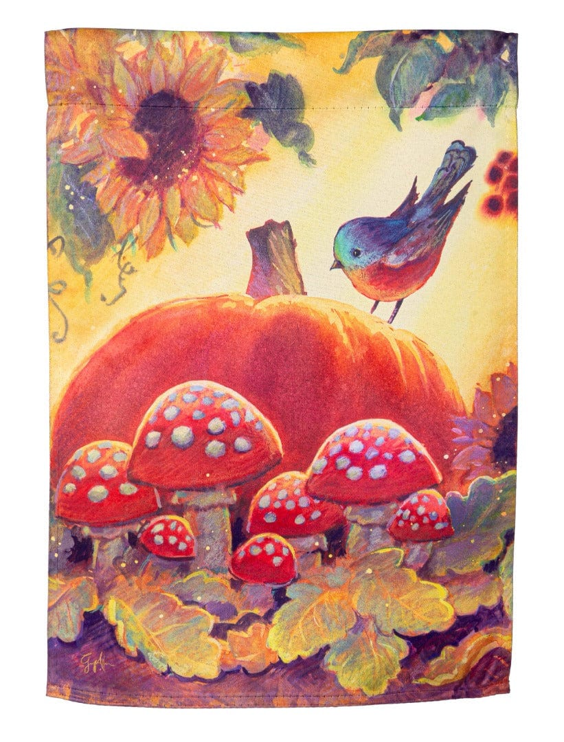 Fall garden flag with orange pumpkin, red mushrooms, and a bluebird among leaves